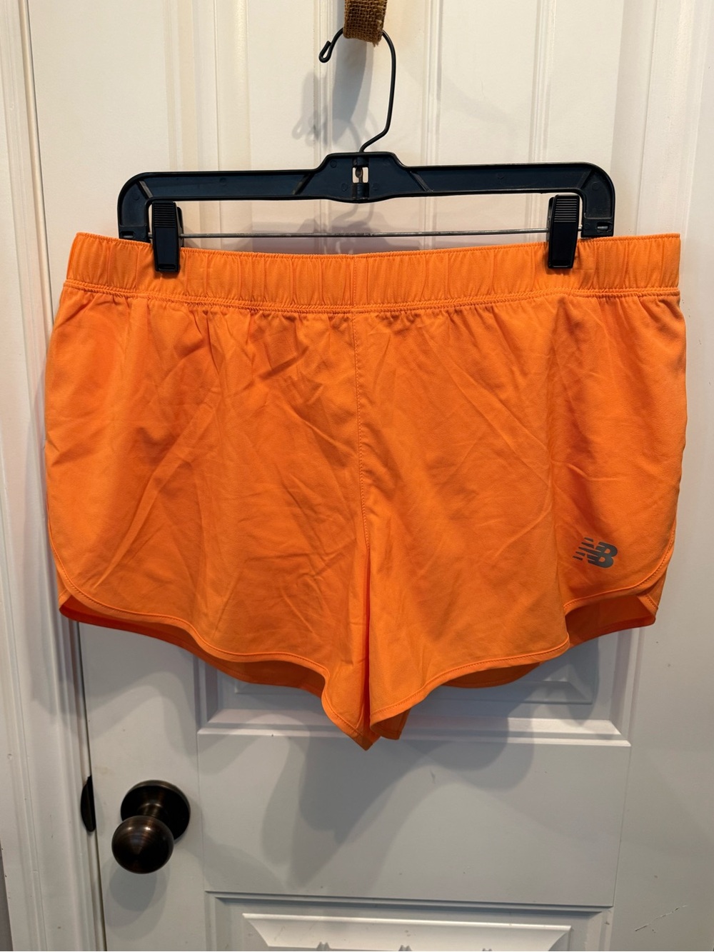 New Balance Women's Bright Orange Athletic Shorts